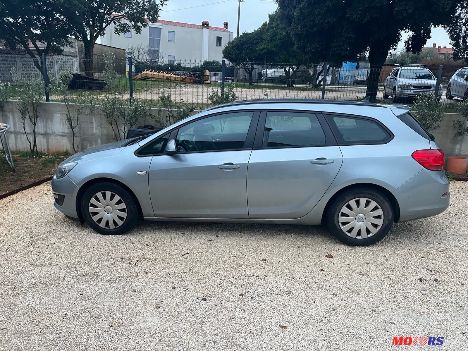 2014' Opel Astra Karavan photo #4