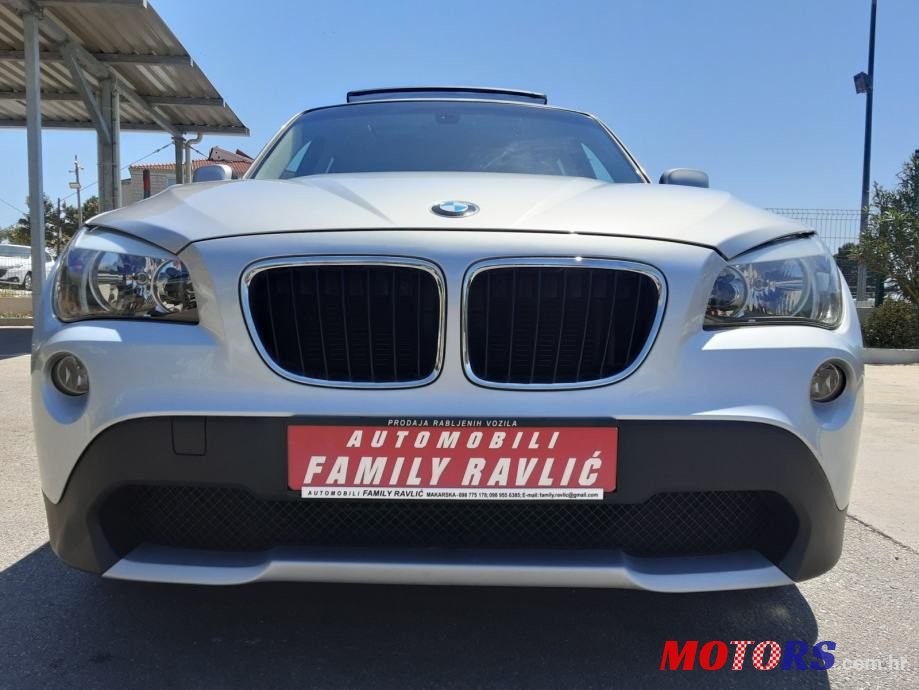 2011' BMW X1 Sdrive20D photo #2