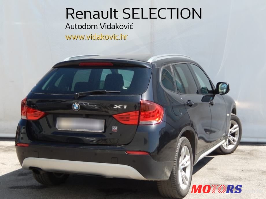 2010' BMW X1 Xdrive18D photo #2