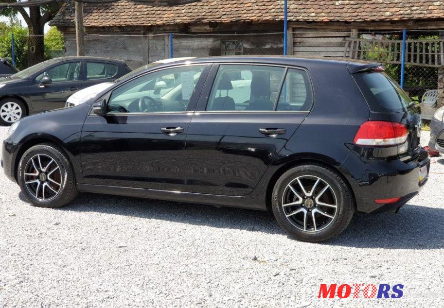 2009' Volkswagen Golf VI 1,6 Tdi photo #1