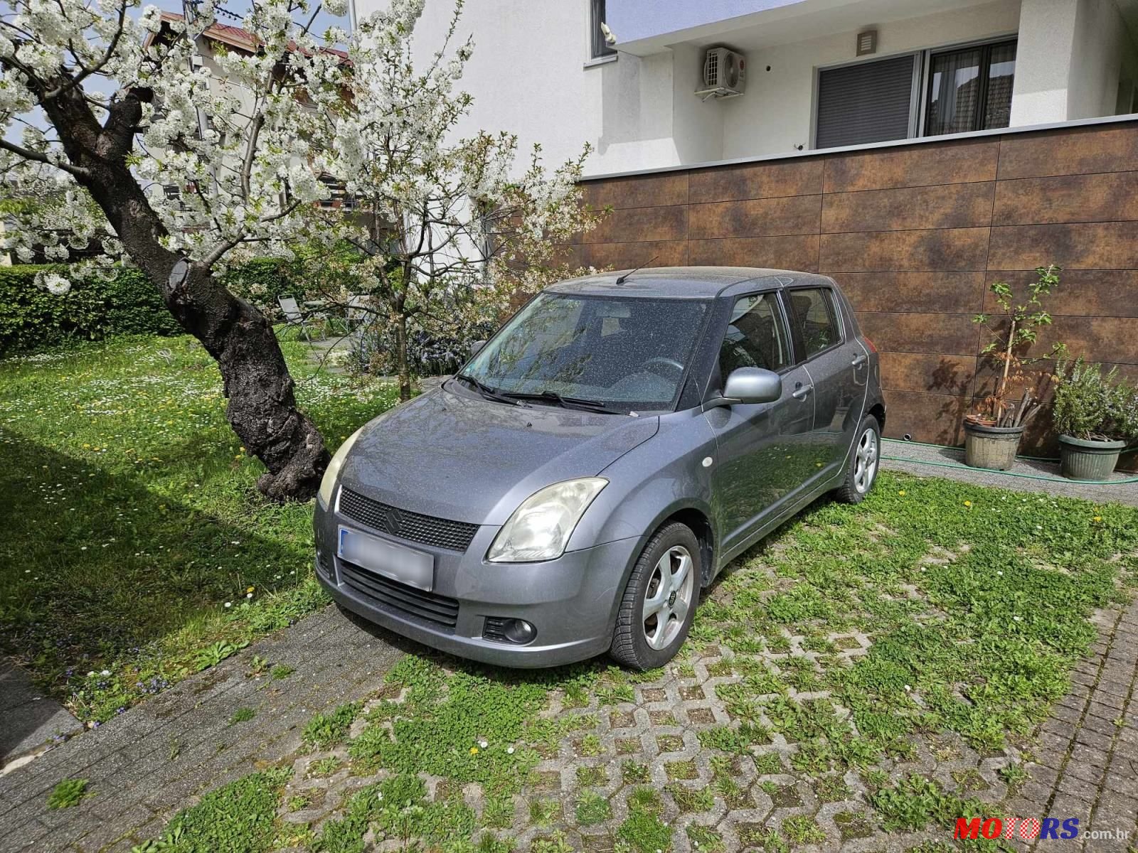 2009' Suzuki Swift 1,3 Gc photo #2