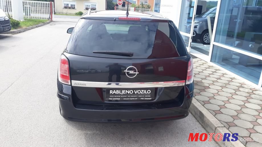 2012' Opel Astra Karavan photo #6