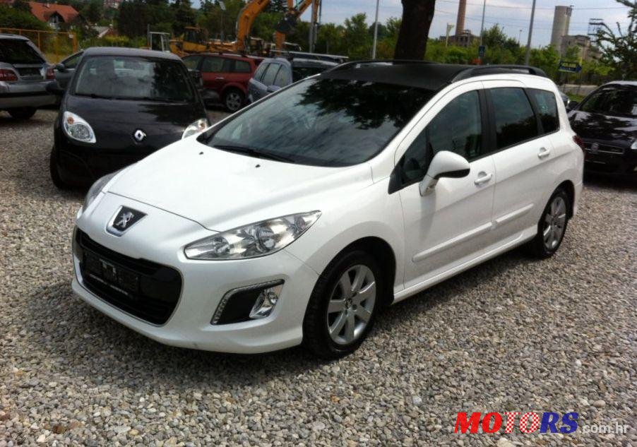 2012' Peugeot 308 Sw 1,6 E-Hdi photo #1