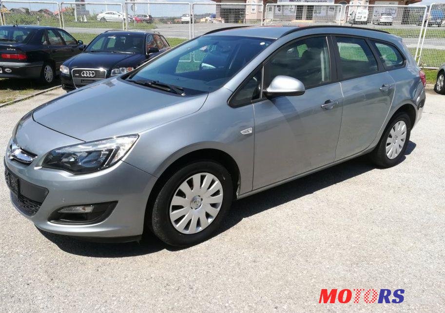 2014' Opel Astra Karavan photo #2