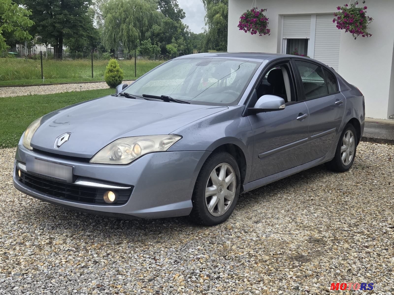 2009' Renault Laguna 1,5 Dci photo #1