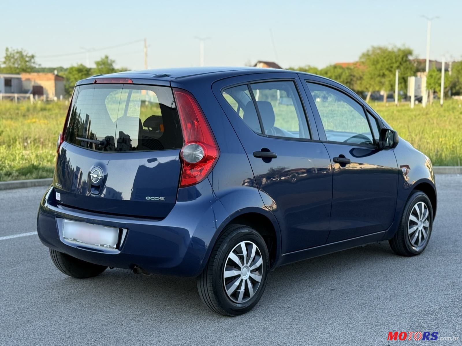 2009' Opel Agila 1,0 photo #6