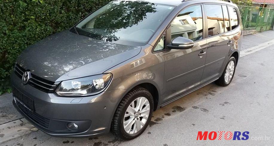2014' Volkswagen Touran 1,6 Tdi photo #1