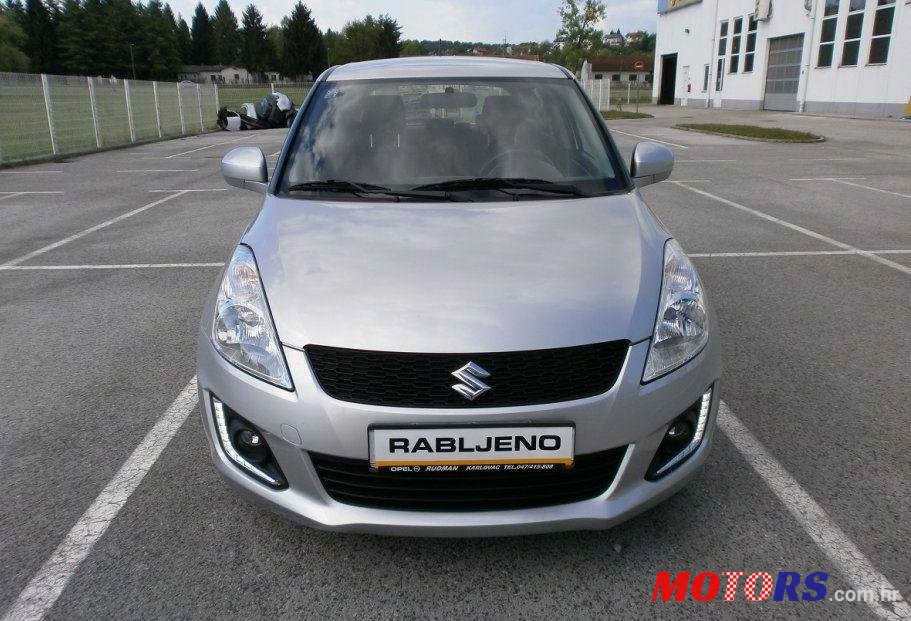 2015' Suzuki Swift 1,3 Ac photo #1