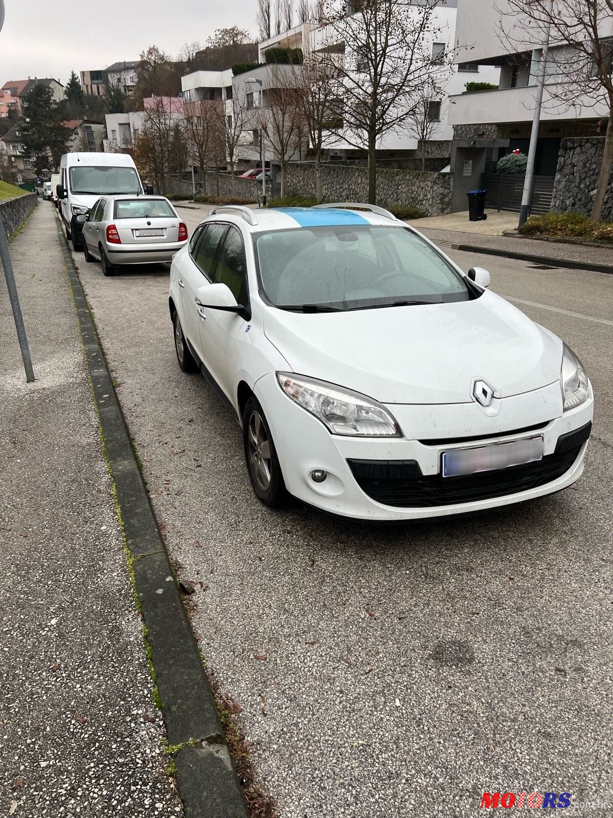 2011' Renault Megane Grandtour photo #1