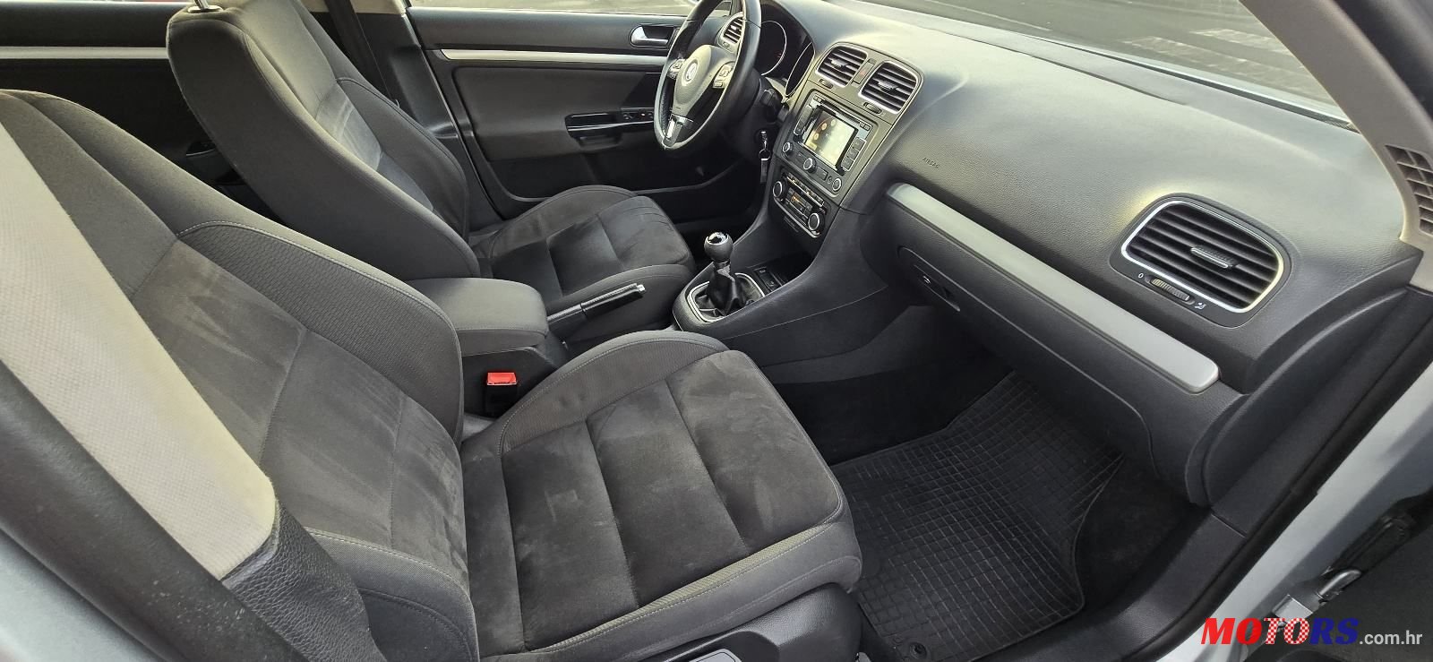 2012' Volkswagen Golf VI Variant photo #6