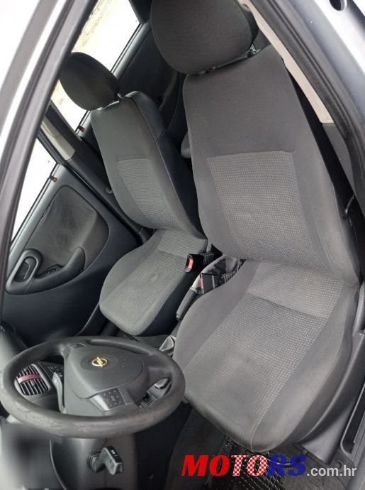 2004' Opel Corsa 1,2 16V photo #6