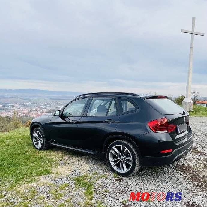 2013' BMW X1 Sdrive photo #2