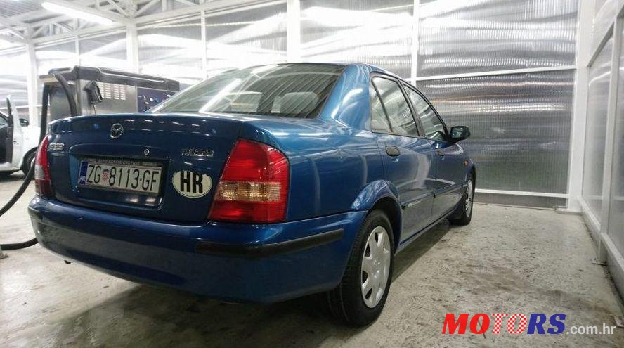 1999' Mazda 323 Sedan 2,0 D photo #1