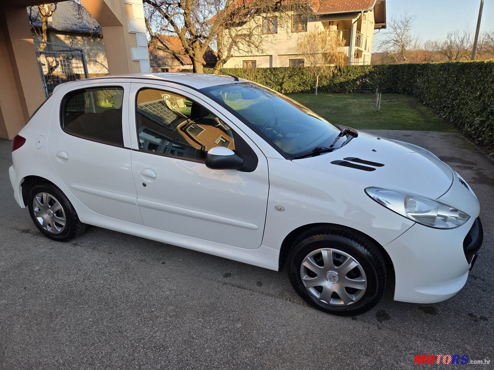 2012' Peugeot 206 1,4 photo #1