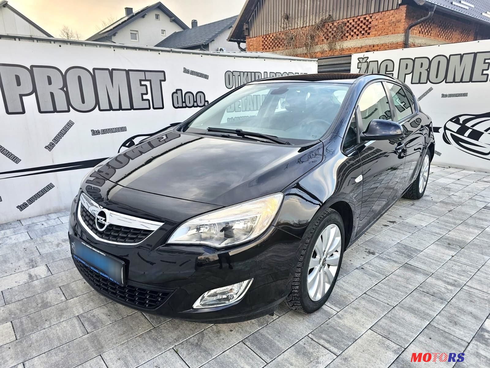 2011' Opel Astra 1,6 photo #1