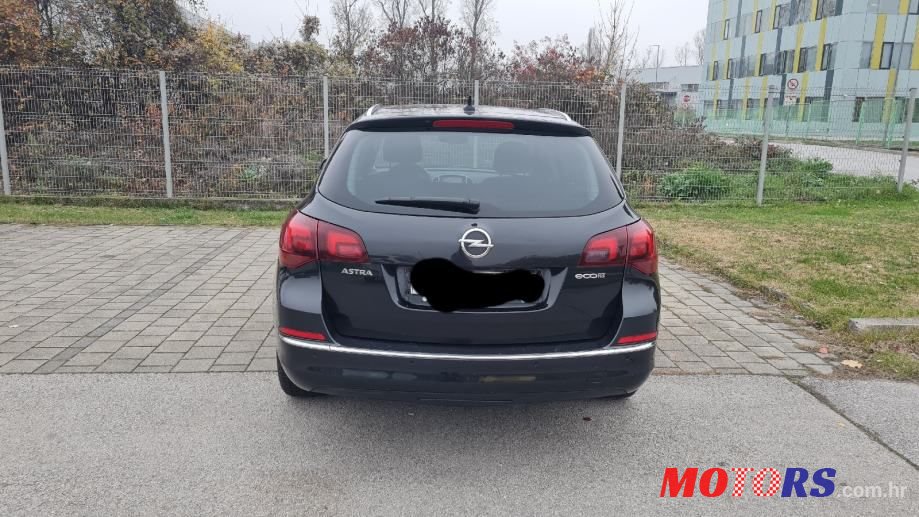 2013' Opel Astra Karavan photo #4