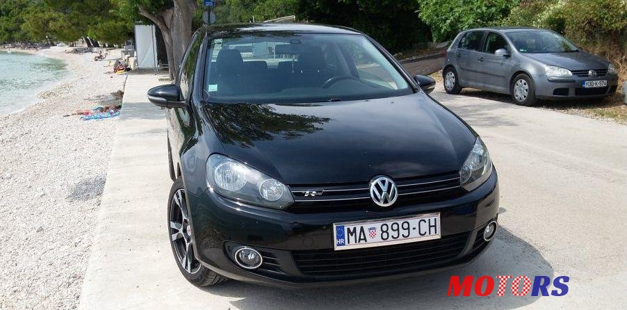 2011' Volkswagen Golf VI 1,6 Tdi photo #1