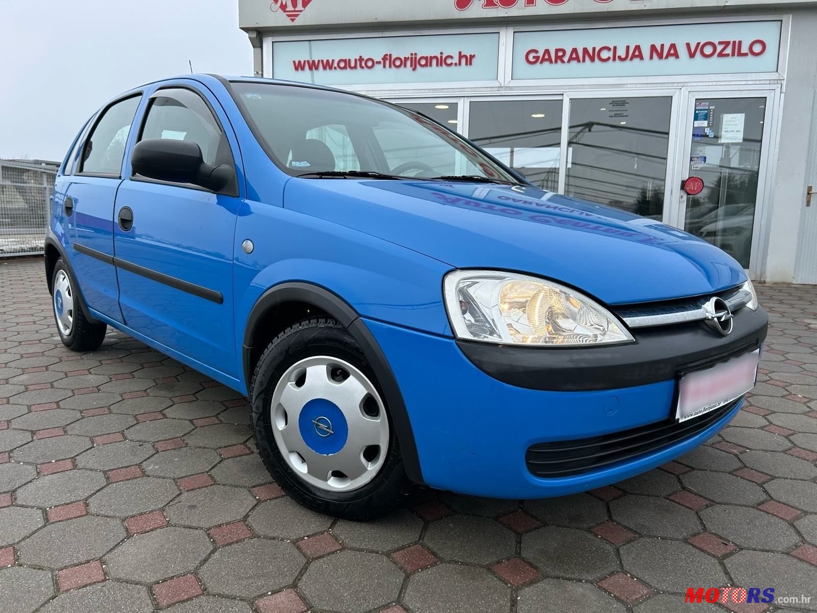 2003' Opel Corsa 12V photo #1