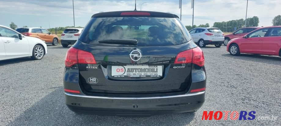 2015' Opel Astra Karavan photo #4