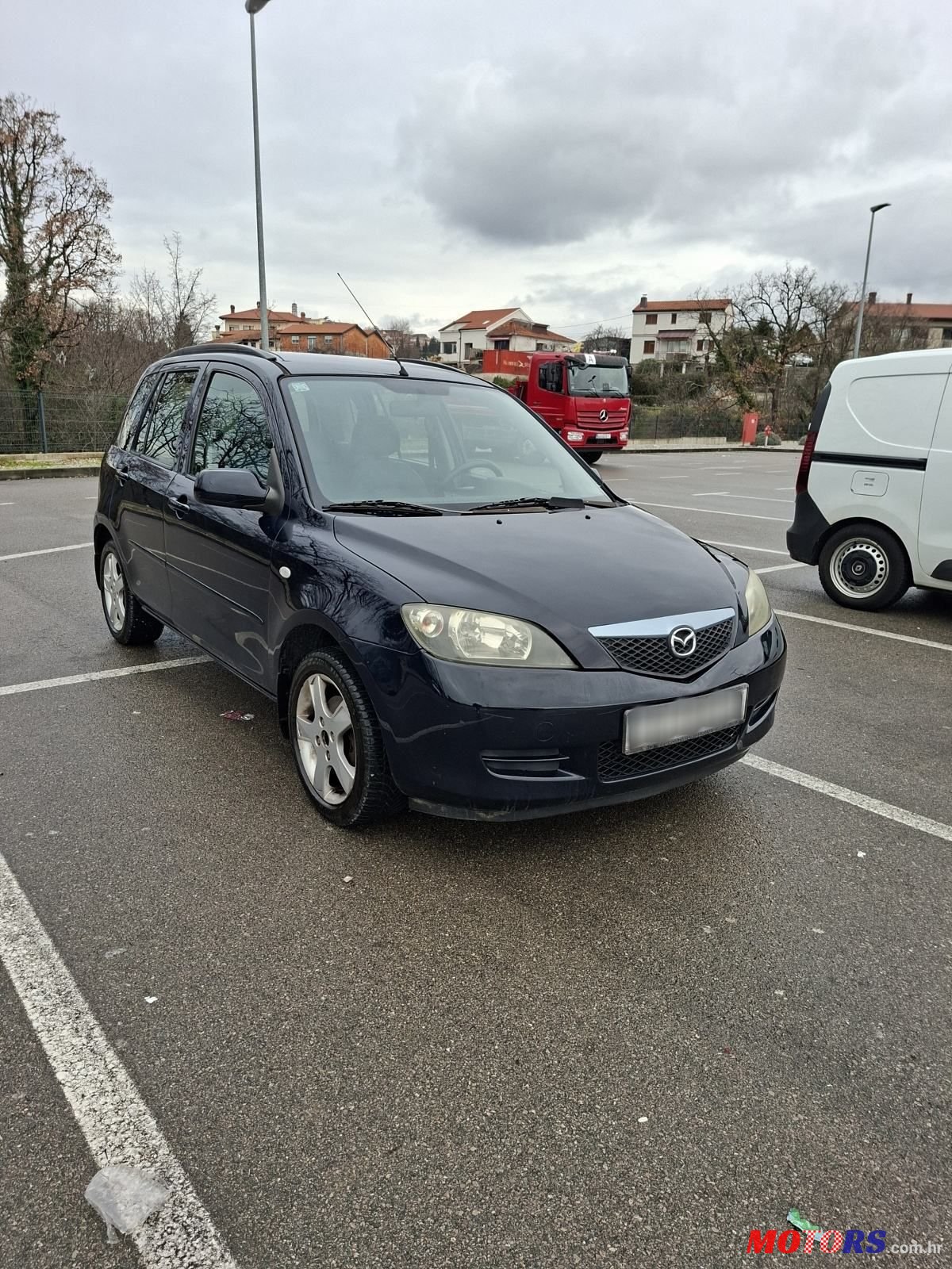 2005' Mazda 2 1.25 photo #2