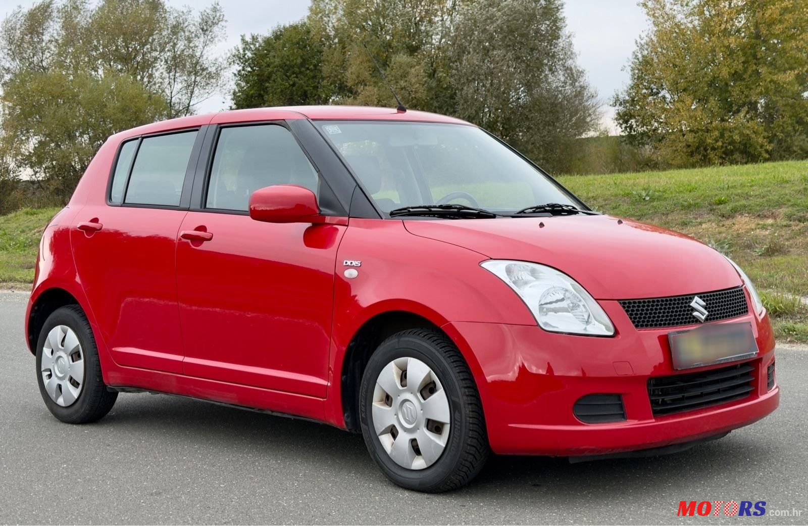 2006' Suzuki Swift 1,3 Glx photo #1