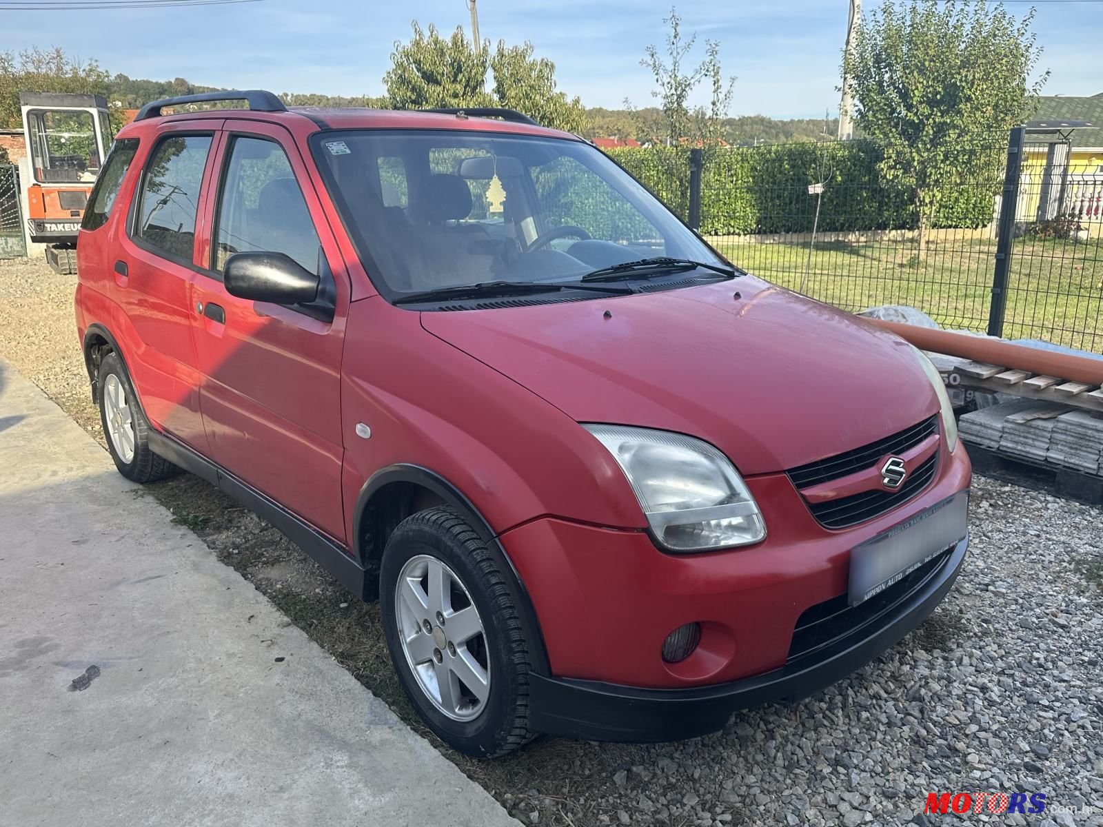 2004' Suzuki Ignis 1,3 Gl photo #1