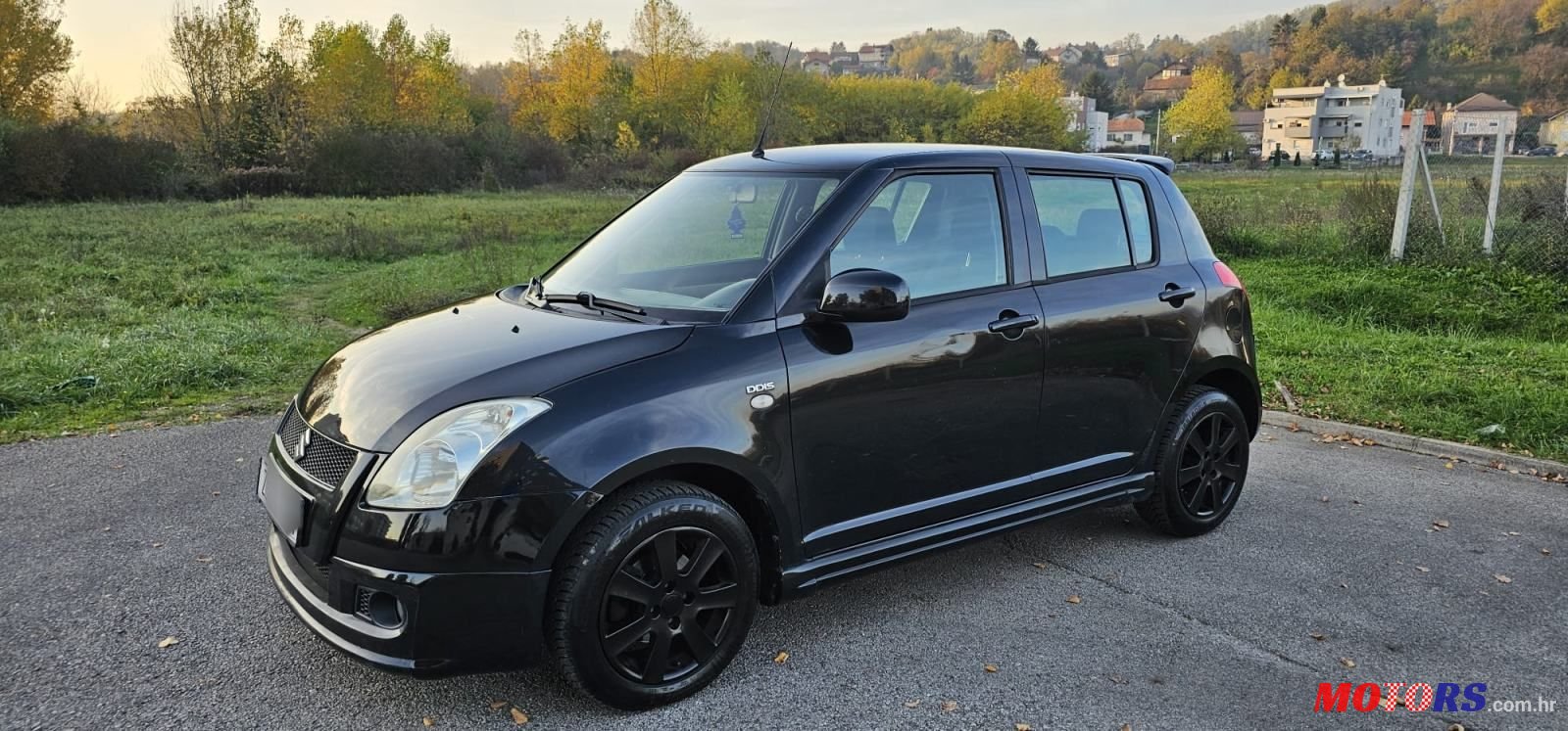 2009' Suzuki Swift 1,3 Glx photo #3