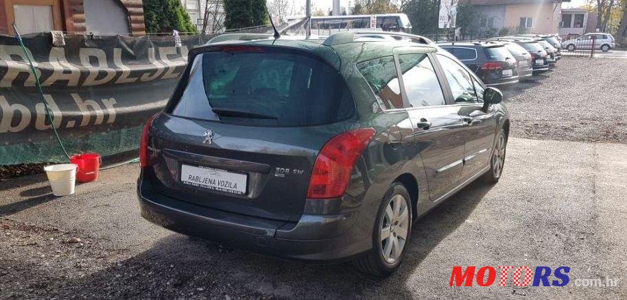 2012' Peugeot 308 Sw photo #2