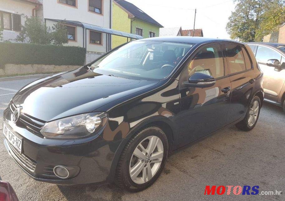 2012' Volkswagen Golf VI 1,6 Tdi photo #1