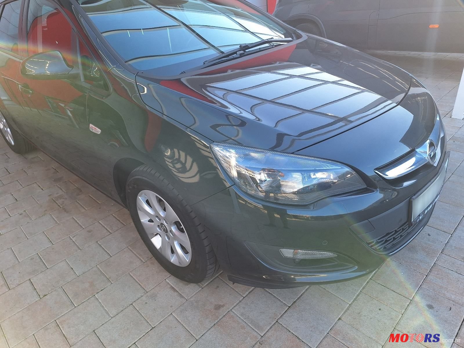 2015' Opel Astra Karavan photo #4