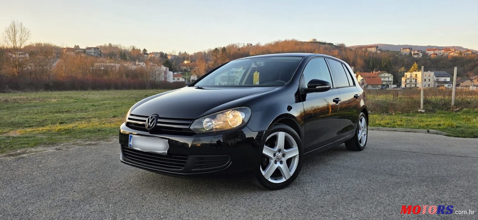 2009' Volkswagen Golf VI 1,6 photo #4