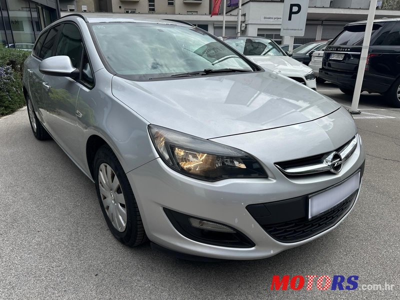 2014' Opel Astra Karavan photo #1