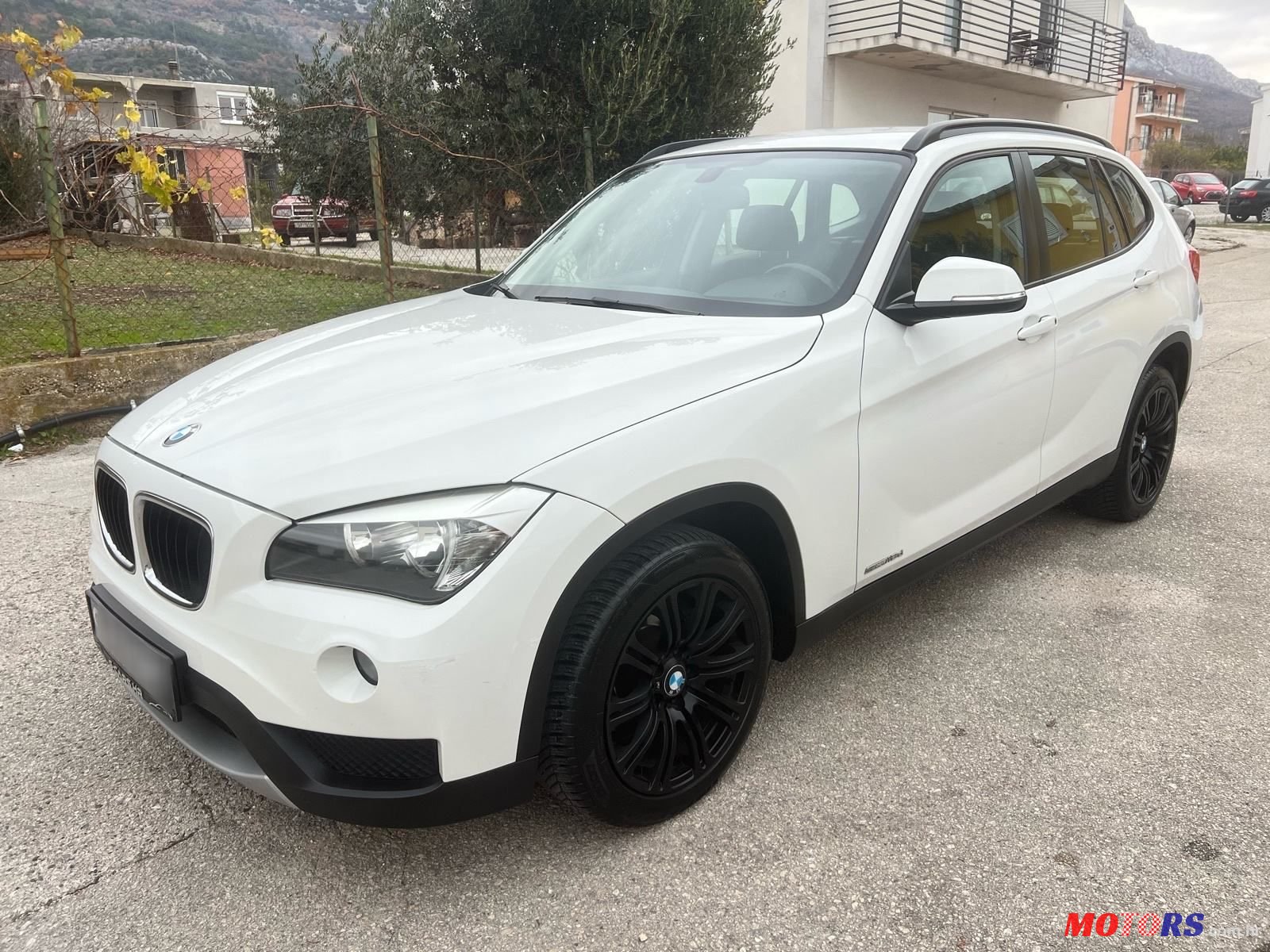 2014' BMW X1 Sdrive18D photo #5