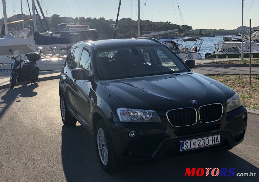 2011' BMW X3 Xdrive20D photo #1
