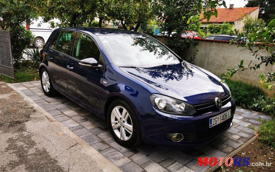 2012' Volkswagen Golf VI 1,6 Tdi photo #1