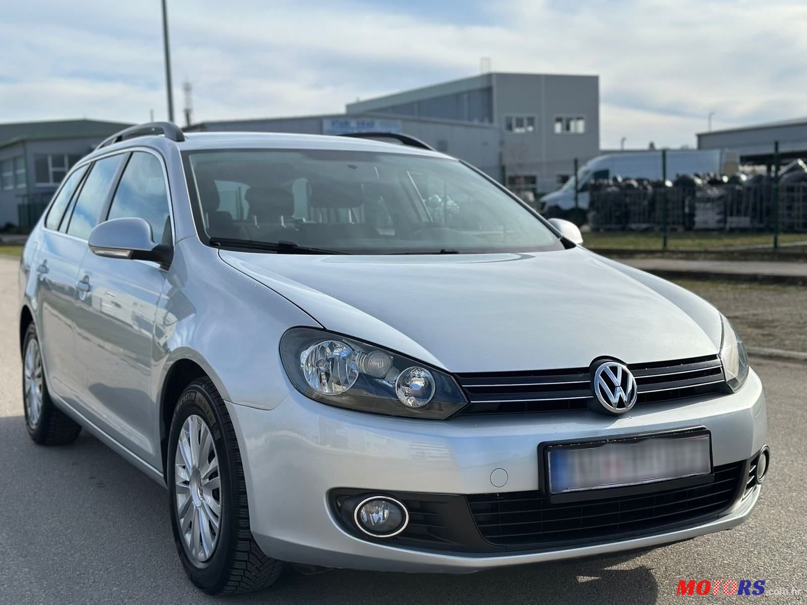 2011' Volkswagen Golf VI Variant photo #2