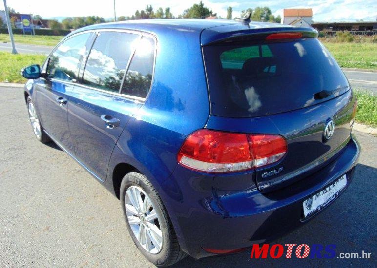 2011' Volkswagen Golf VI 1,6 Tdi photo #1