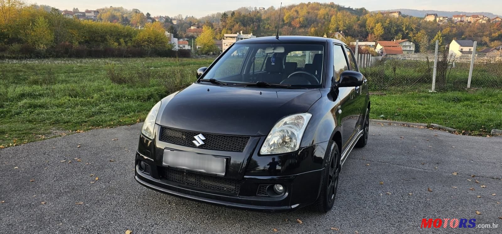 2009' Suzuki Swift 1,3 Glx photo #4