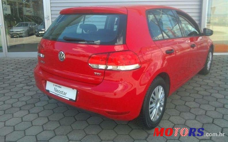 2012' Volkswagen Golf VI 1,6 Tdi photo #1