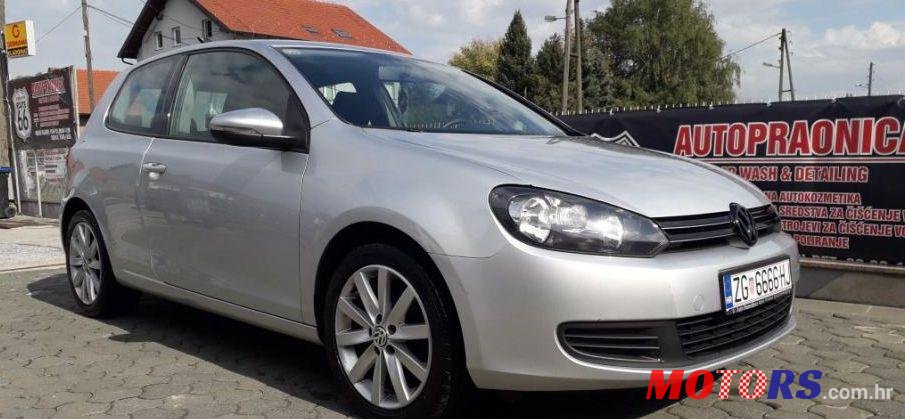 2011' Volkswagen Golf VI 1,6 Tdi photo #1