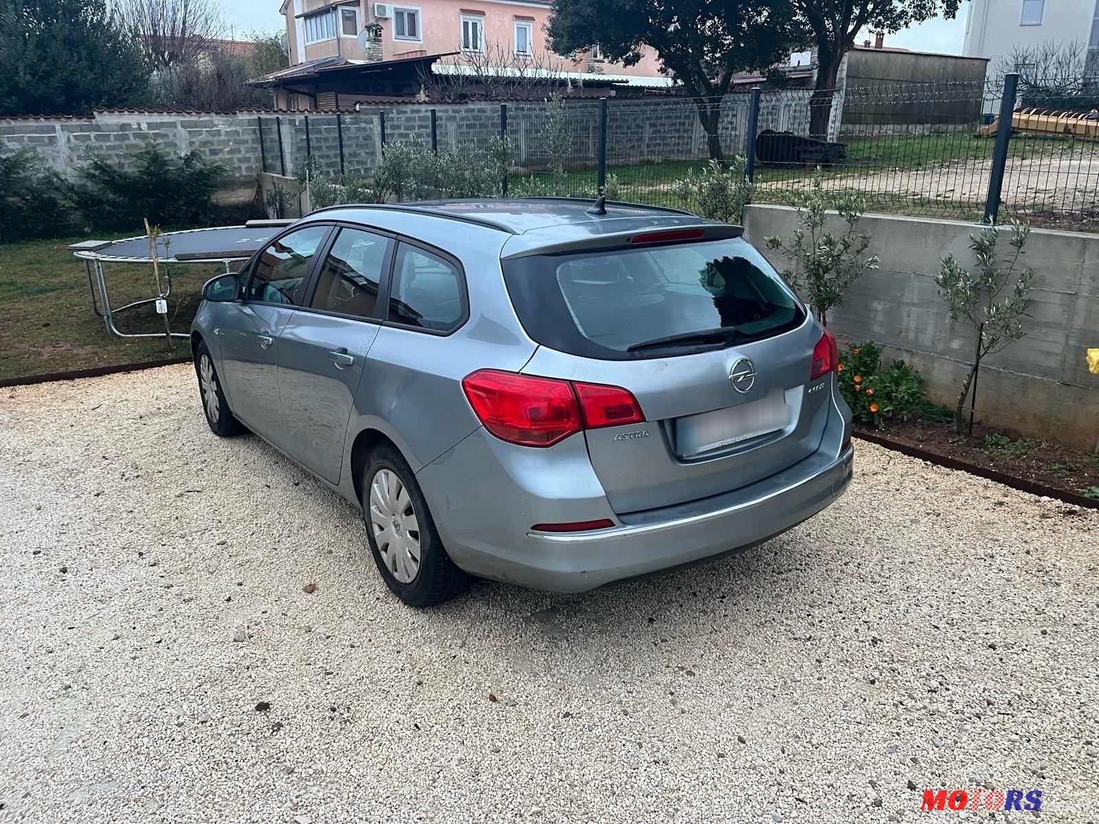 2014' Opel Astra Karavan photo #3