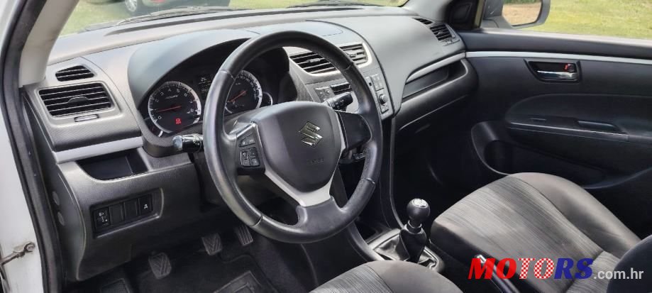 2013' Suzuki Swift 1,3 photo #4