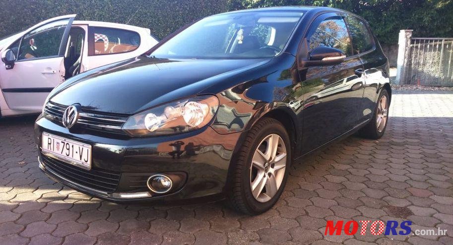 2010' Volkswagen Golf VI 1,6 Tdi photo #1