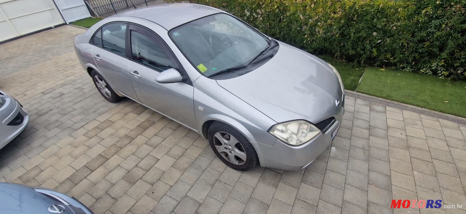 2006' Nissan Primera 1,6 16V photo #1