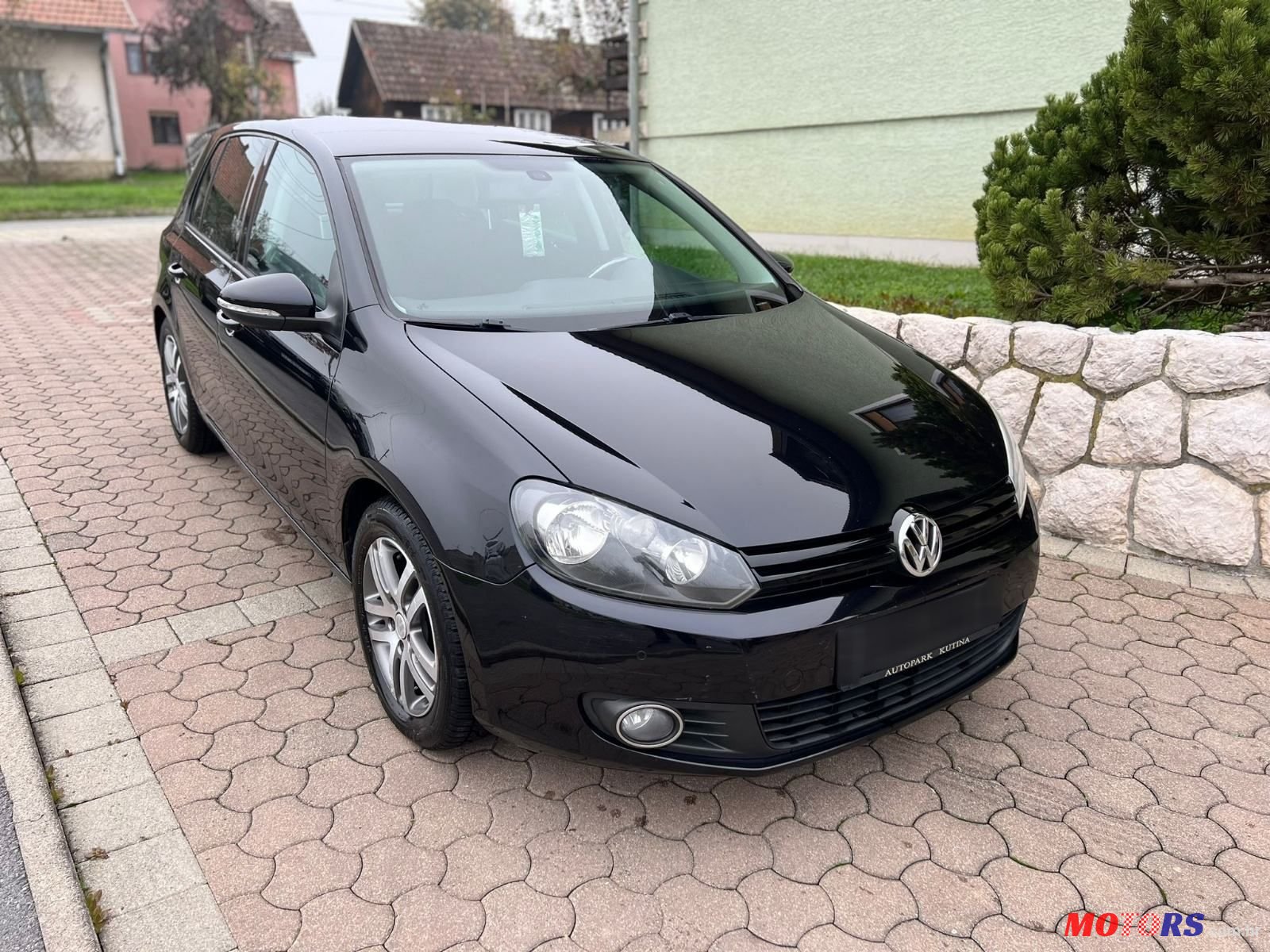 2010' Volkswagen Golf VI 1,6 Tdi photo #1