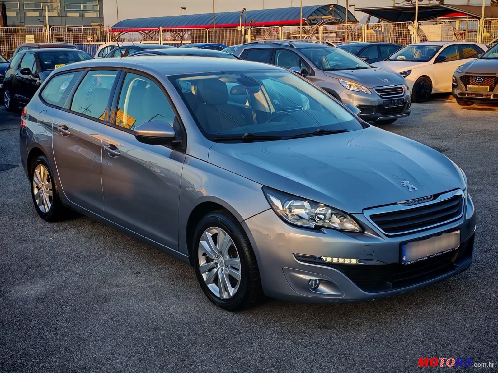 2015' Peugeot 308 Sw photo #1