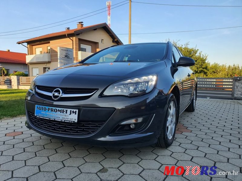 2014' Opel Astra Karavan photo #1