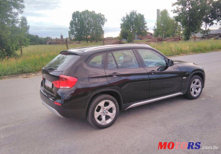 2011' BMW X1 Xdrive18D photo #1
