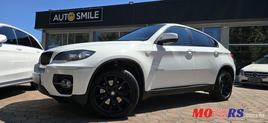 2011' BMW X6 40D photo #1