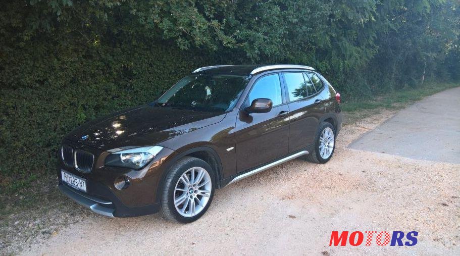 2011' BMW X1 Xdrive18D photo #1